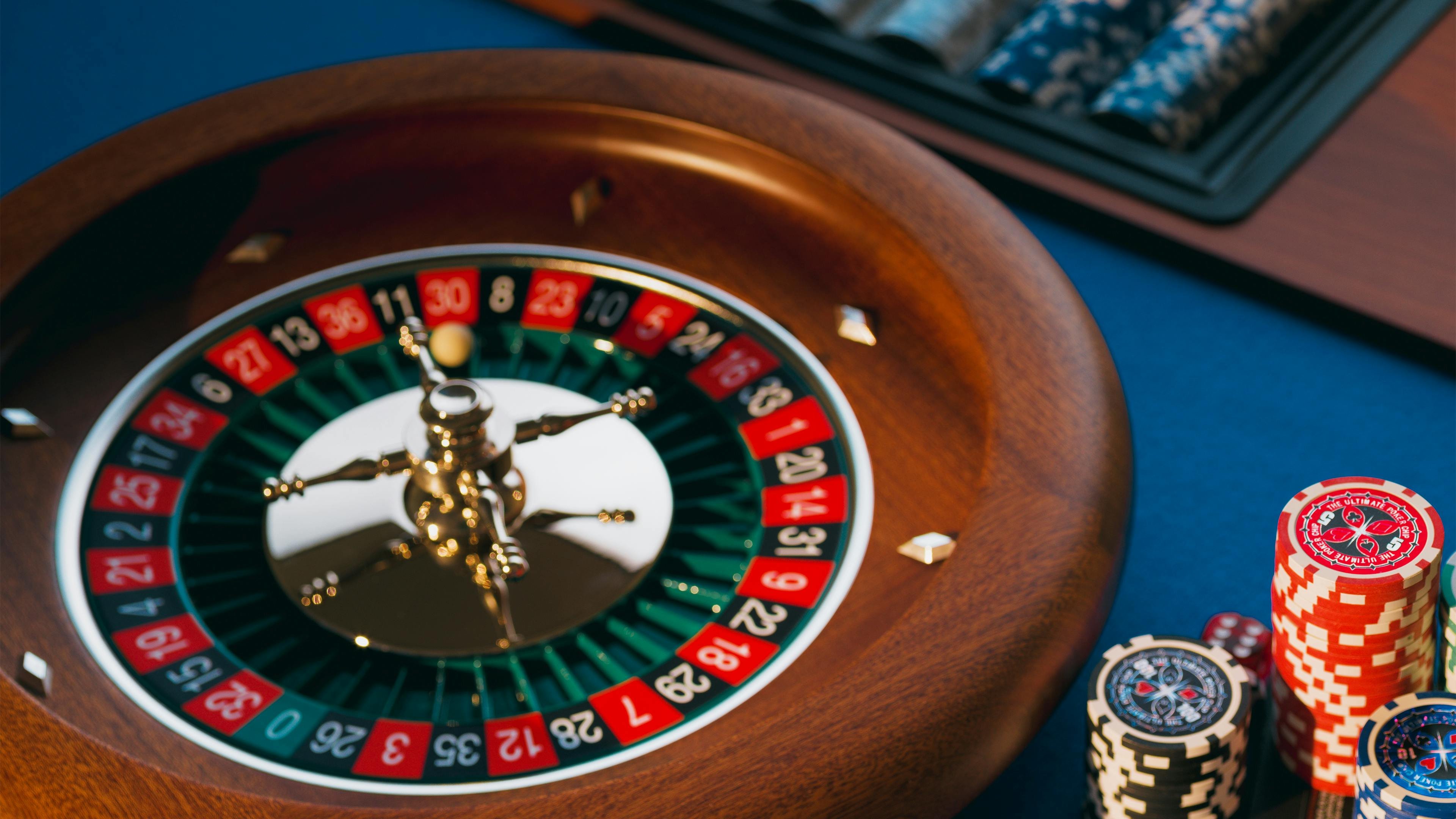 French Roulette wheel and betting layout displayed on betwin login live-dealer table